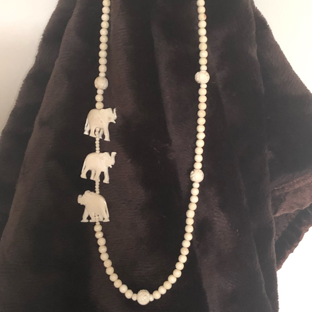 Bone hand carved “Elephant” necklace